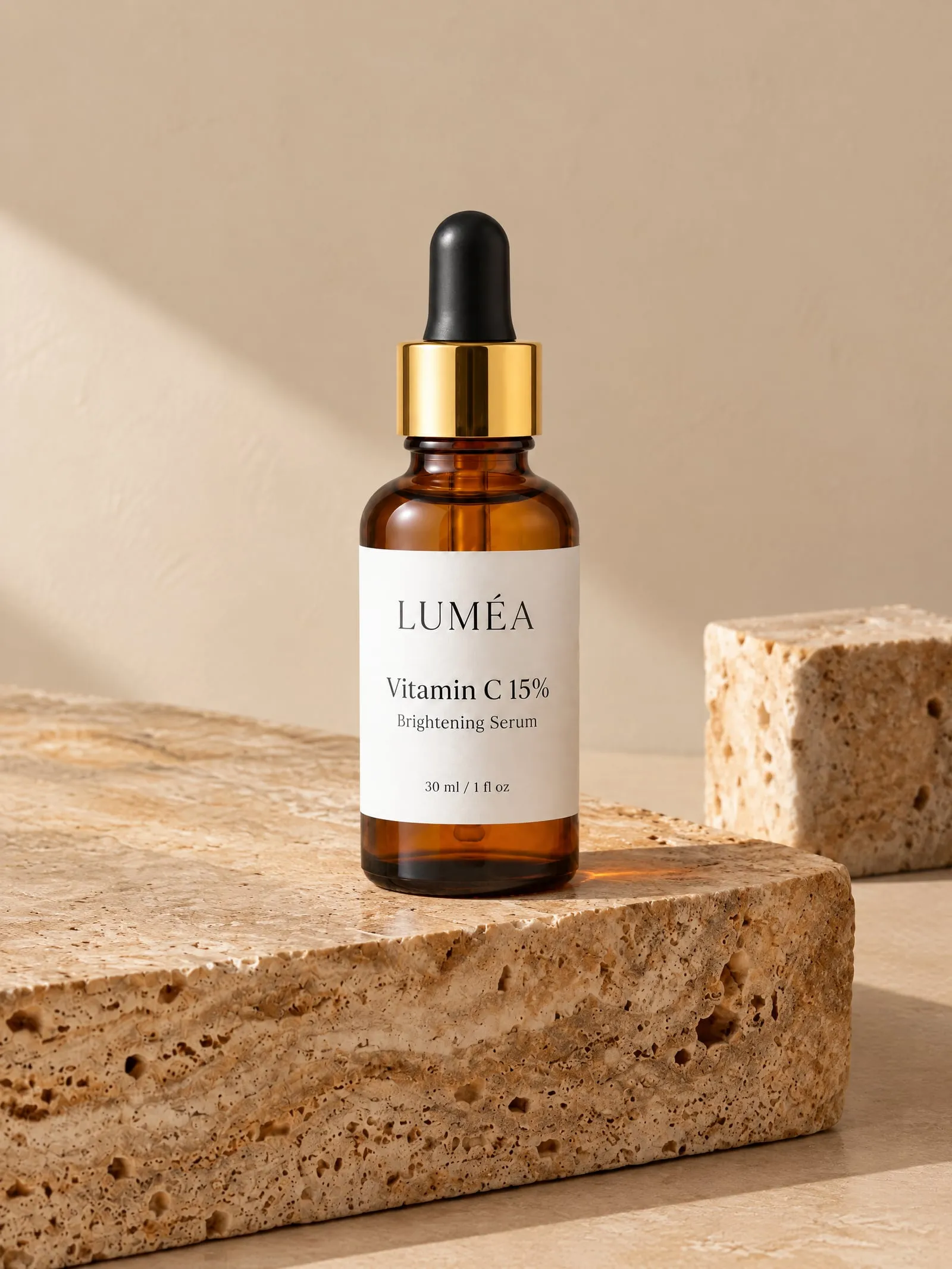 The LUMÉA vitamin C serum, three quarter angle, on travertine stone