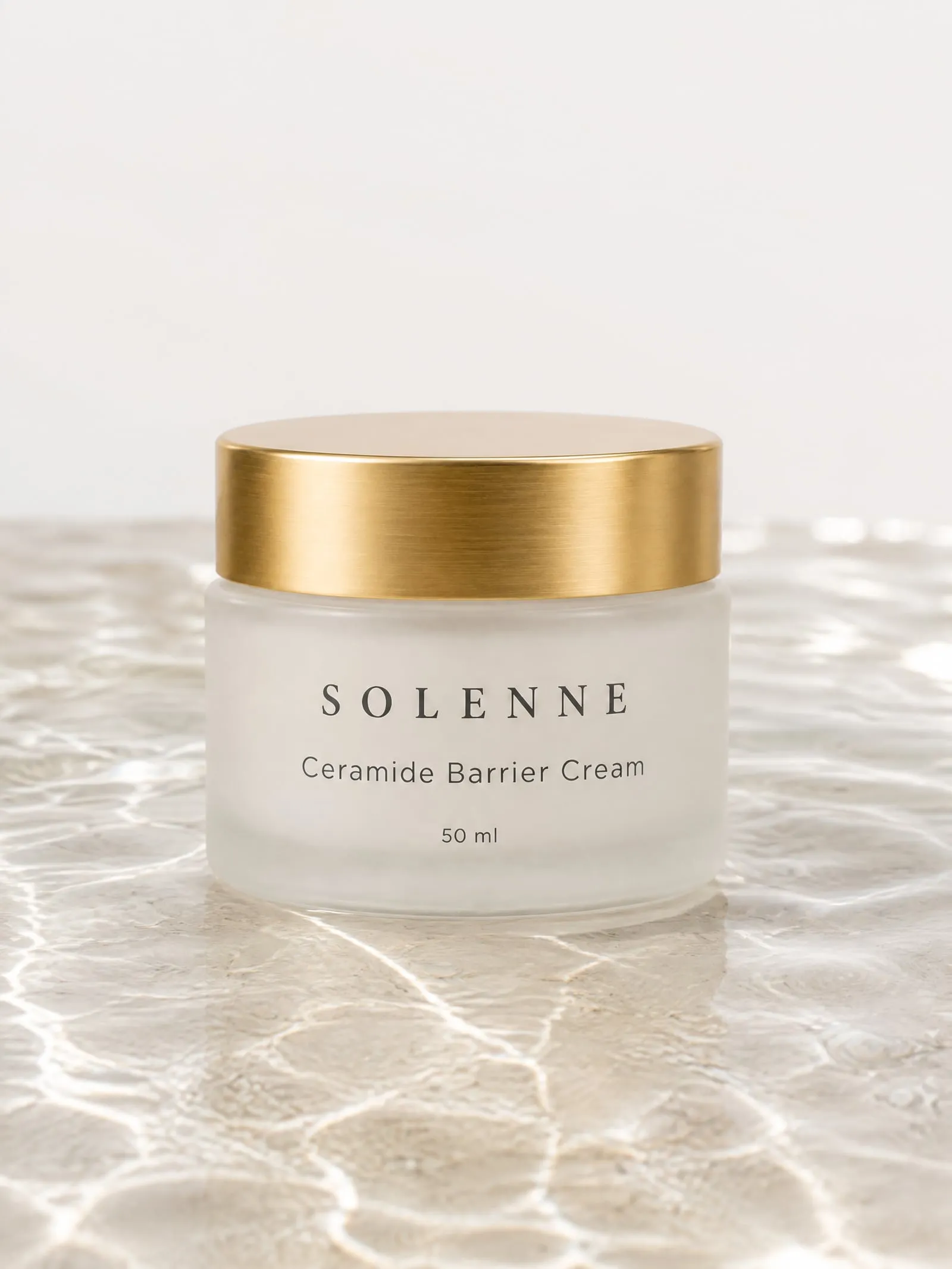 The SOLENNE ceramide cream, front view, in shallow water
