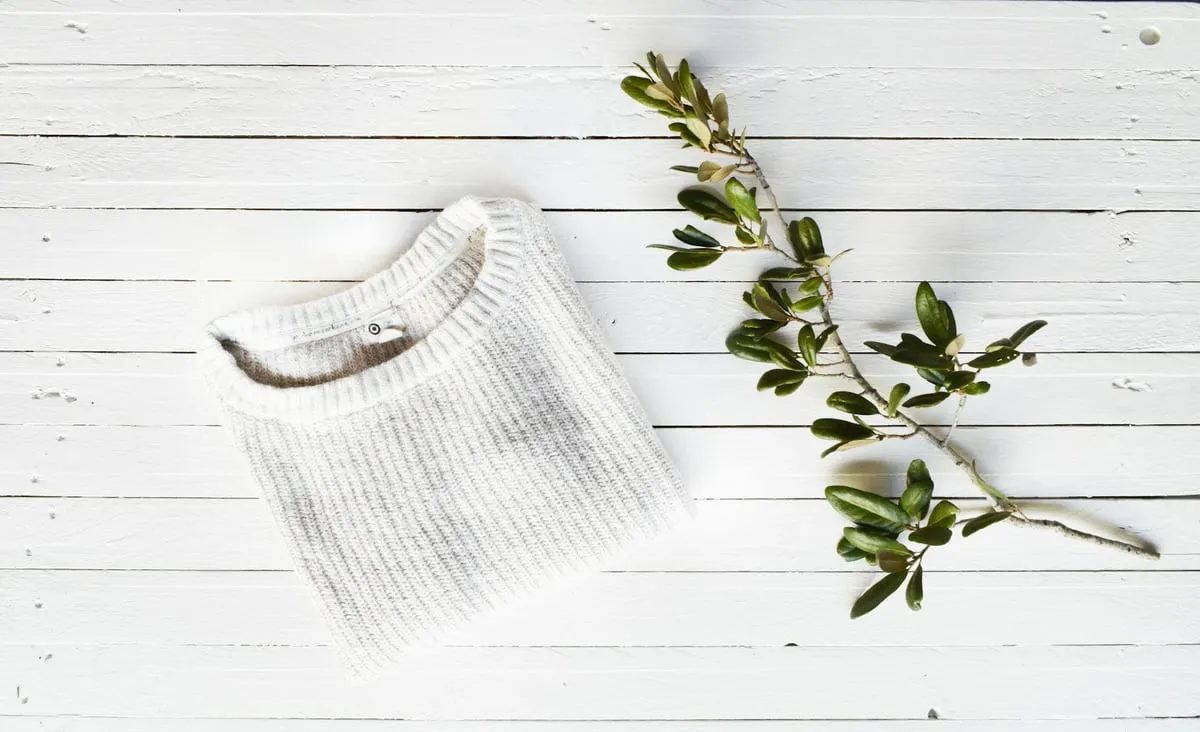 The white knit sweater, the product photo the shoot started from